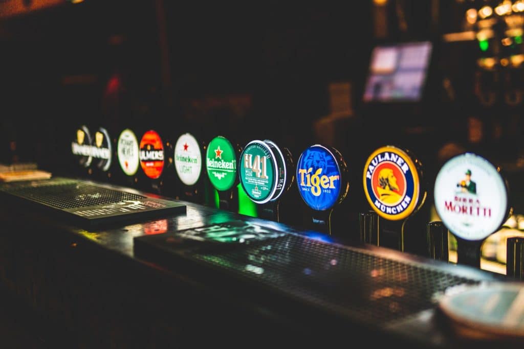 A variety of pumps with different beer at a pub in Dublin.