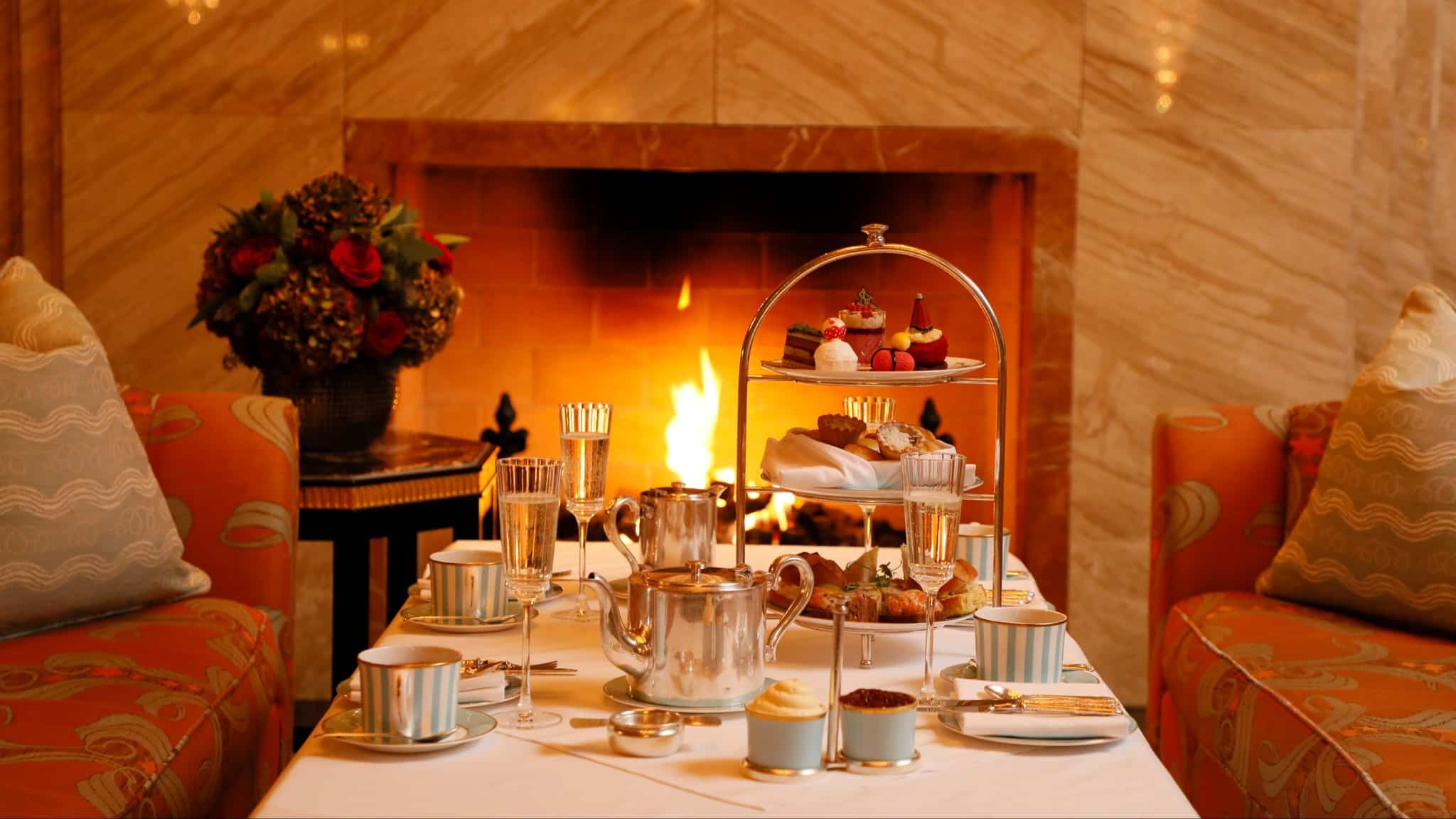 The Westbury at Christmas, with a roaring fire and afternoon tea on the table. 