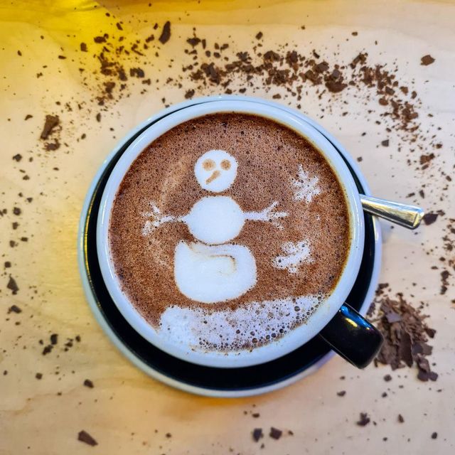 A cup of hot chocolate with a snowman in the froth at Urbanity in Dublin. 