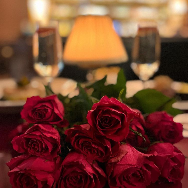 A bunch of red roses on a table at The Odeon, Dublin.