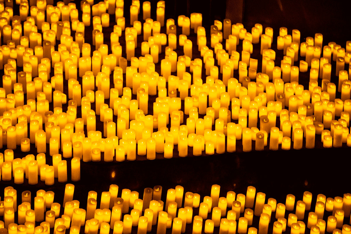 A close-up of hundreds of candles.